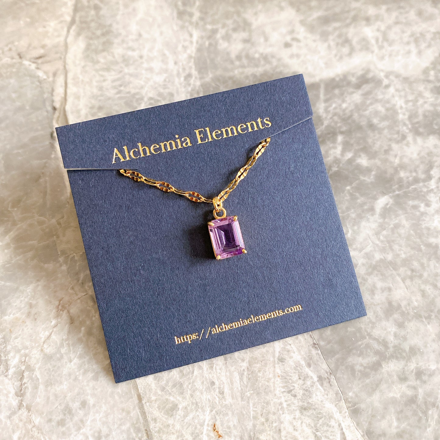 Two bags of Gerdy's Gourmet Popcorn on a wooden surface with a blurred background.